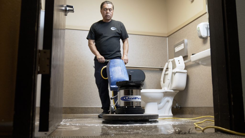 Cleanstart Office Cleaning Services professional office cleaning services - cleaning the restroom floor